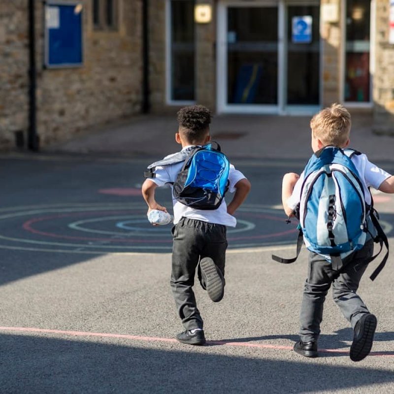 boys-running-playground-school-banner